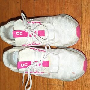 On Running White and Pink Sneakers